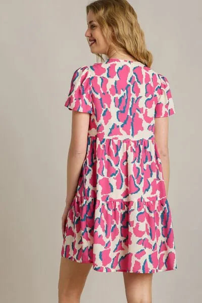 Umgee Full Size Abstract Print Pleat Detail Short Sleeve V - Neck Tiered Dress Plus Size - Reed + Raven